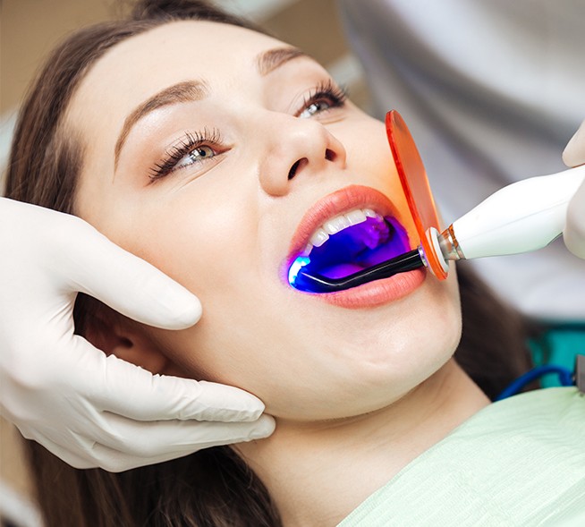 Patient receiving dental bonding