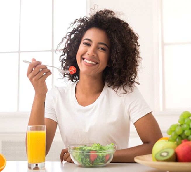 woman eating a salad