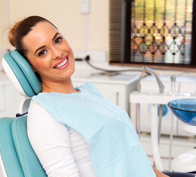 Female patient visiting an emergency dentist in Mount Dora, FL for toothache