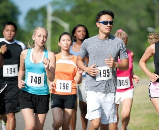 People participating in fun run event