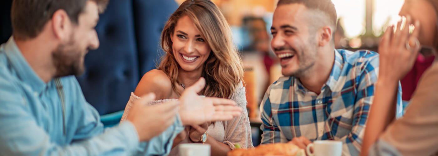 Group of friends laughing together