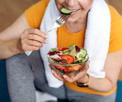 Dental implant patient in Mt. Dora eating healthy 