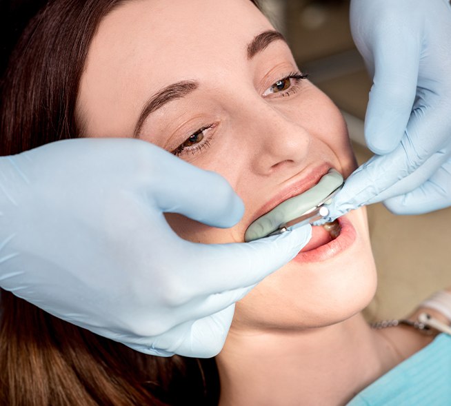 Patient receiving fluoride treatment