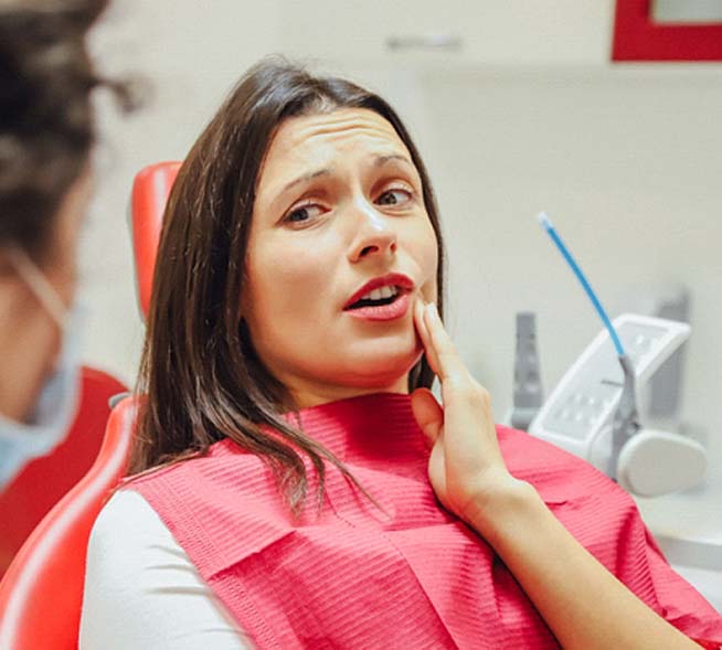 Woman asking about her root canal in Mt. Dora