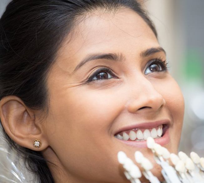 Woman getting porcelain veneers in Mt. Dora