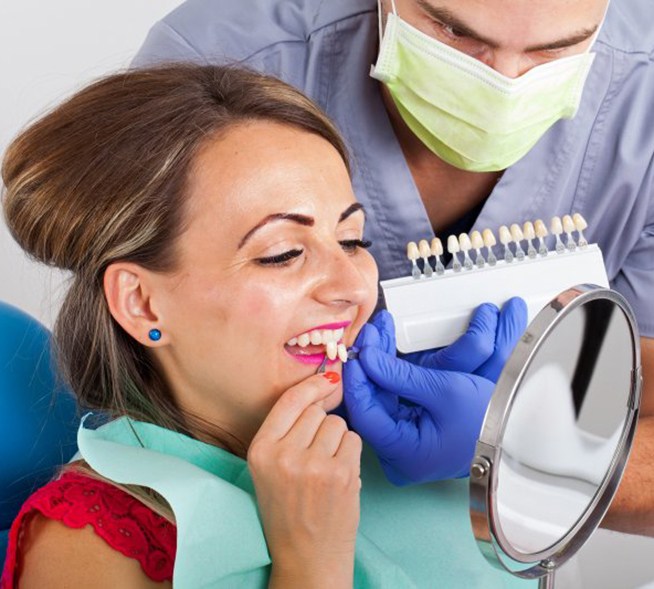 Woman choosing her porcelain veneers in Mt. Dora