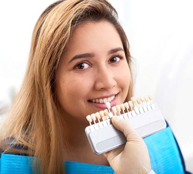 young woman getting veneers in Mount Dora